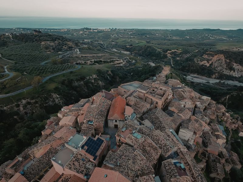 Aerial view showing terrain changes and valleys across a large rural landscape.